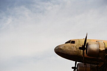 Old airplane fly on the sky