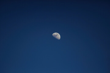 half moon during daylight