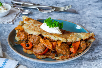 Hungarian goulash with potato pancake