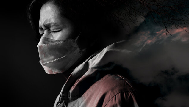 Stressed Asian Person Wearing A Surgical Mask. Mental Health During Coronavirus Concept. Dark Tone, Double Exposure Technique