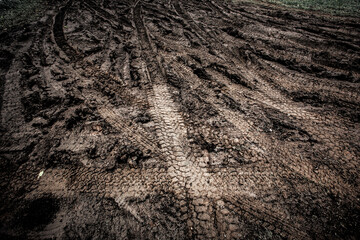 Tyre track on dirt sand or mud, Picture in retro or grunge tone. Car drive on sand. off road track....