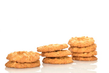 Fototapeta na wymiar Several torchetti cookies with oatmeal, close-up, isolated on white.