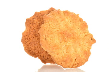 Two torchetti cookies with oatmeal, close-up, isolated on white.