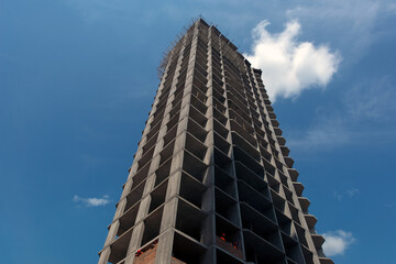 Obraz premium Residential building frame. Construction phase. Energy saving. Production of apartments, social housing.