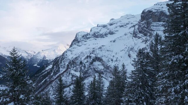 Panorama Oberalpstock - Witenalpstock - Chli Windgallen - Bristen - Hoch Geissberg Mountains. Picturesque Swiss Alps. Scenic Snowcapped Peaks. Switzerland Europe. Slow motion