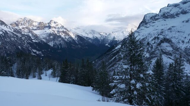 Panorama Balmeten - Oberalpstock - Witenalpstock - Chli Windgallen - Bristen - Hoch Geissberg Mountains. Picturesque Swiss Alps. Scenic Snowcapped Peaks. Switzerland Europe. Slow motion