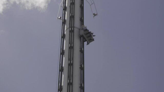 Slow Motion Apocalypse ride, Dropping down at Drayton Manor Theme Park, UK.