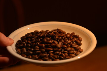 Coffee beans on a plate.