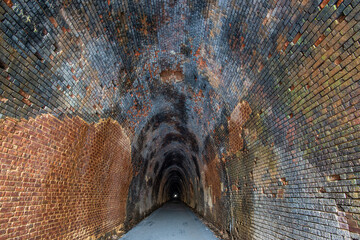 Brickwork inside the western end of the historic Blue Ridge Tunnel in Afton, Virginia. Old railroad...