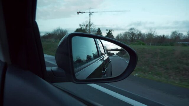 4K 60p Side Mirror View. Empty Highway Expressway Suburban Road. Coronavirus Lock-down Quarantine. Travelling by Car POV. France Europe.