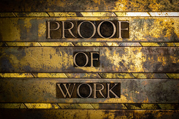 Proof Of Work text formed with real authentic typeset letters on vintage textured silver grunge copper and gold background