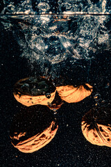 several walnuts thrown in water