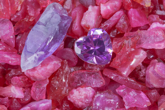 .heart amethyst diamonds on raw ruby rough gemstone
