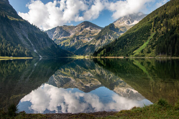 
The Vilsalpsee in the morning in the nature reserve of the Tannheimer Valley in Tyrol / Austria
