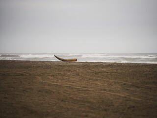 Traditional peruvian Totora Balsa reed fishing boat raft canoe on Pimentel Beach Lambayeque Peru...