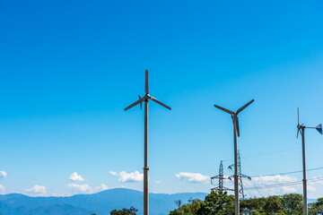 Fototapeta na wymiar Old windmill for green energy production.