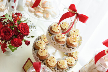 Lovely cupcakes on a candy bar at the wedding party