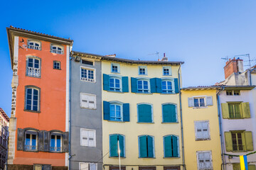 Medieval street of the old town of le Puy en Velay (Auvergne, France) with colorful facades