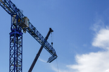 Construction crane assembling the structure