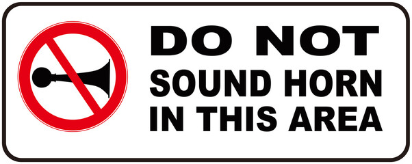 A sign that says  do not sound horn or no honking. Warning no honk in this area. 