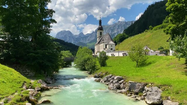 Scenic mountain landscape in the Bavarian Alps with famous Parish Church of St. Sebastian in the village of Ramsau, Nationalpark Berchtesgadener Land, Upper Bavaria, Germany