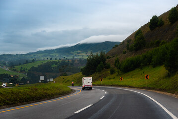 Fototapeta premium Small truck on a highway in the department of Boyaca.Colombia