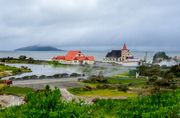New Zealand, Northern Island. View of Lake Rotorua and Saint Faith`s Church and Ohinemutu