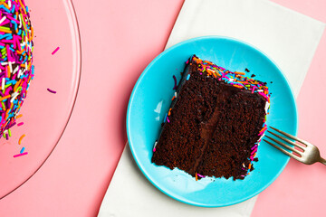 Chocolate layer cake with colorful sprinkles