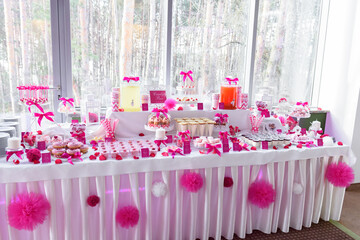 Pink sweet table at the wedding party