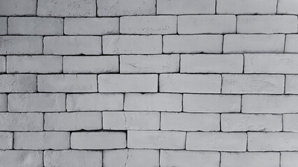 Gray or grey brick wall for background in black and white tone or monochrome. Brickwork wallpaper and Pattern concept