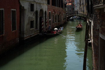 Fototapeta na wymiar Gondola on canal. Trip to Venezia summer 2019. Venice, Italy.