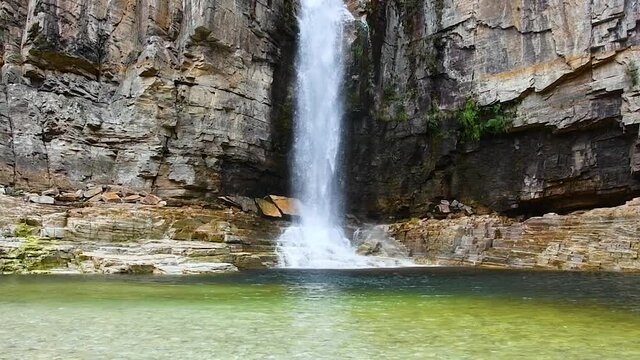 Waterfall of the Canyons de Furnas at Capit&oacute;lio - MG, Brazil. Canyons composed of sedimentary rocks, green vegetation and the green water of the lake of Furnas, also known as Mar de Minas.