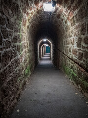 Fototapeta na wymiar Walking through the Smuggler's Tunnel to Ness Beach in Shaldon, Devon, England, UK