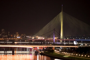 New so called Bridge over the Ada in Belgrade, capitol of Serbia. Beautiful night view on panoramic Belgrade 