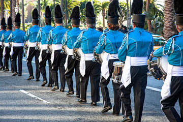 Marching band with drums dressed in blue