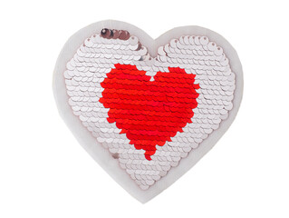 White and red sequin heart isolated on white background