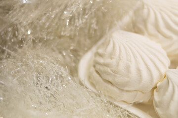 Marshmallow. Delicacy. Tinsel. Dessert. White.