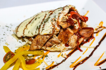 Colombian fast food arepa stuffed with meat and cheese