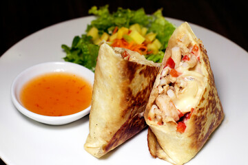 Colombian food crepes, burritos with salsa