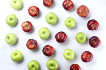 Red delicious and granny smith apples.  Flat Layer. Healthy food and juicy fruit concept