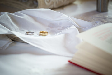 wedding rings on a pillow