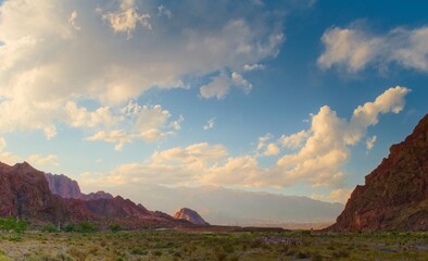 Gorgeous puffy clouds over the Andes mountains at sunset in Uspallata, Mendoza, Argentina.