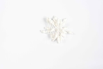 Bamboo cotton sticks, Cotton buds, ear wax, Cotton swabs orizontal frame with place for text. Spa concept.Hygienic sanitary swabs on white background. Top view.