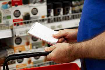 Men, supermarket. basket ,shopping mall, customer, store. list of products