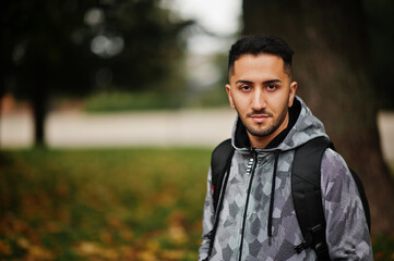 Student kuwaiti man wear at hoodie with backpack.