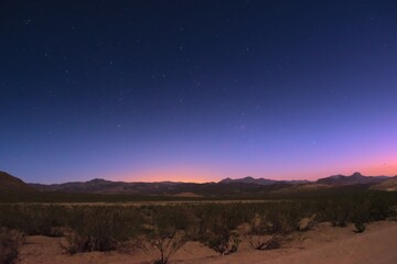 Fototapeta na wymiar Starry twilight sky over the desert near Uspallata, Mendoza, Argentina.