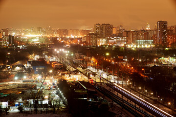 Fototapeta na wymiar Moscow, Russia. Desember 23 2020: Trains and the Moscow skyline. Ostankino railway platform.