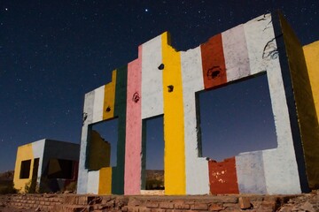 Starry night sky over a derelict house in the middle of the desert near Uspallata, Mendoza,...