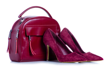Woman red bag and high heel shoes on white background isolation