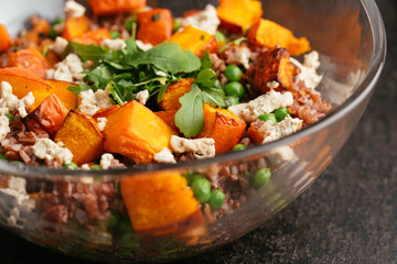 Roasted Winter Squash with Red Rice, Peas and Carrots